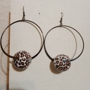 Hoop earrings with a leopard printed bead